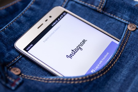 Icon instagram on the smartphone screen in your jeans pocket. Cheboksary, Russia, 02/17/2019のeditorial素材