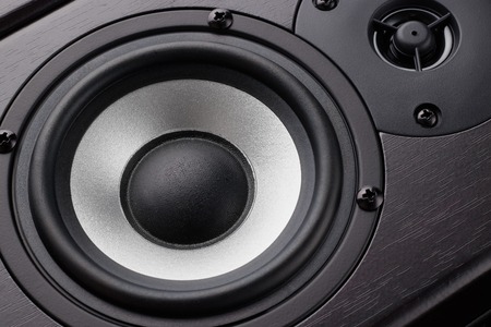 Wooden multimedia system in black close-up. Loudspeakers. Audio speakers.の写真素材