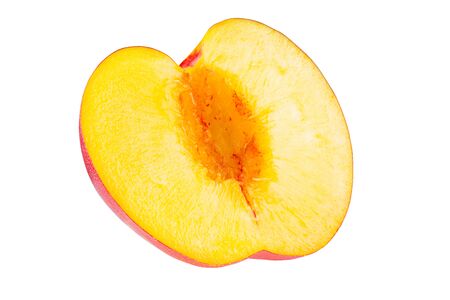 Nectarine fruit segment is isolated on a white background with the pen tool. The whole depth of field.の写真素材