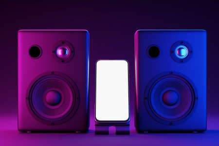 Mockup of a smartphone with a white screen on the background of music speakers. Neon lighting of music clones. White screen smartphone mockup for your app design. 3d renderingの写真素材