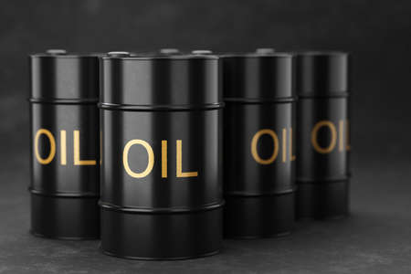 Several metal barrels of black color. 3D rendering.の写真素材