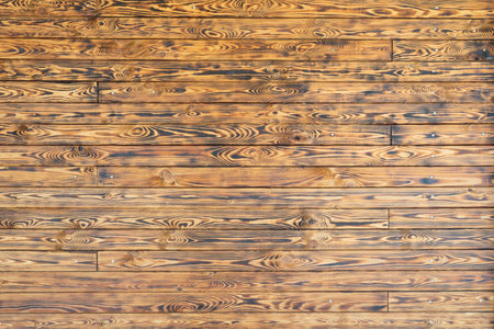 Old grunge dark textured wood background, surface of old brown wood texture. Aged wooden background. Burnt wooden boards.の写真素材