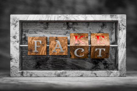 Write fake or fact. Differences in truth. Truth or lie. Spreading disinformation in the state. Deceiving citizens, leading to war. 3D rendering.の写真素材