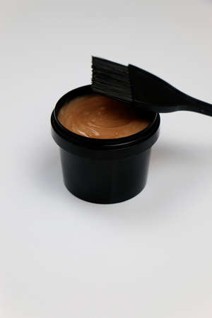 Home hair care. Hair mask in jar. Glossy hair. Health. Hair brush in jar. High quality photo