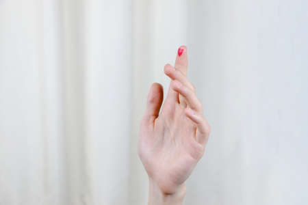 Diabetes awareness. World Diabetes Day concept. Close up of man with red heart on forefinger. . High...