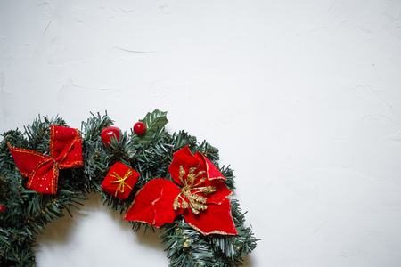 detail of a Christmas wreath on a white textured background, copy spaceの写真素材