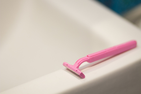 shaving tools : foam, shaver. Safety pink razor with shaving cream, shaving procedure for face, legs, hands, bikiniの写真素材