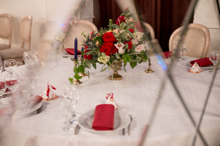table decor for wedding ceremony, table setting, flowers, red and white decorの写真素材