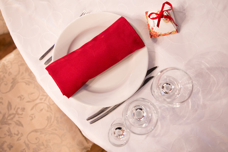 table decor for wedding ceremony, top view table setting, flowers, red and white decorの写真素材