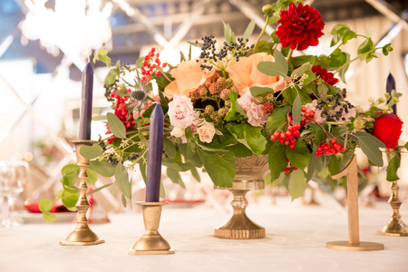 table decor for wedding ceremony, table setting, flowers, red and white decorの写真素材