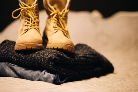 Set of men's clothing on a wooden background. Fashionable winter men's clothing.の写真素材