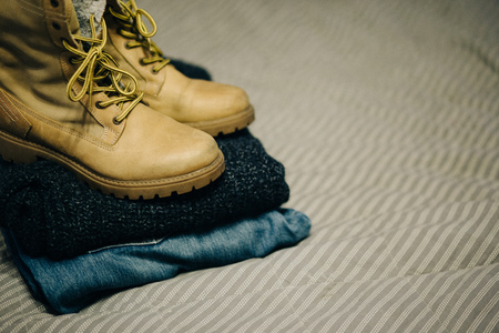 Set of men's clothing on a wooden background. Fashionable winter men's clothing.の写真素材