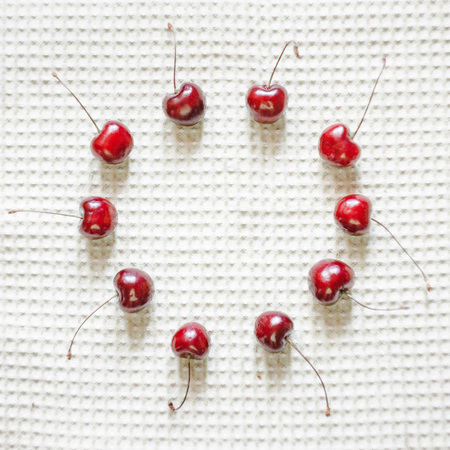 Fresh cherry pattern on towel background. fresh ripe cherries. sweet cherries.の写真素材