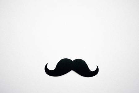 Paper Mustache on light blue background, Prostate cancer awareness , Men health awareness month, copy spaceの写真素材