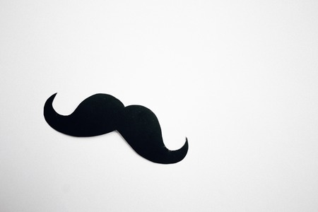 Paper Mustache on light blue background, Prostate cancer awareness , Men health awareness month, copy spaceの写真素材