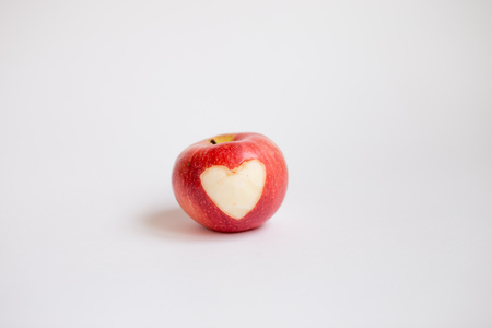 Red Apple with engraved heartの写真素材