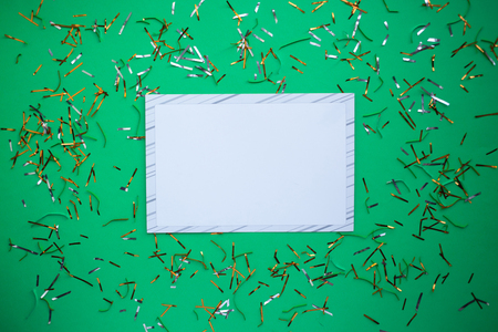 festive confetti, greeting card, christmas decoration on the green background ,copy spaceの写真素材