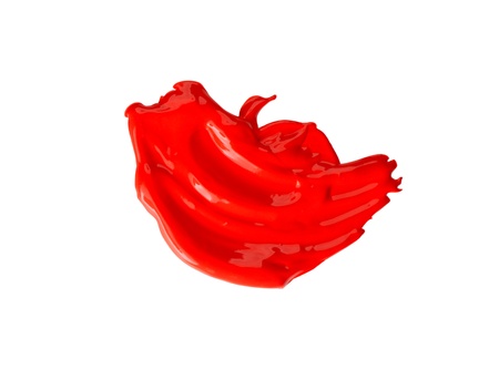 Red paint over white background with copy spaceの写真素材