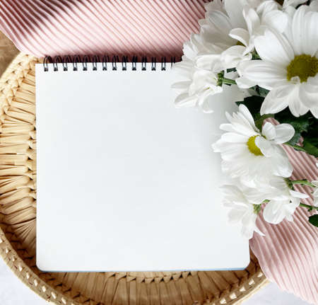 Mockup for a postcard with flowers, powdery fabric