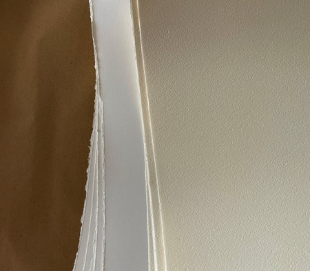 Sheets of paper with texture on a craft background
