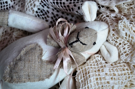 White sheep tilde handmade with pretty bowの写真素材
