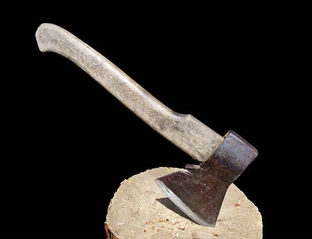 Old axe isolated on a black background  の写真素材