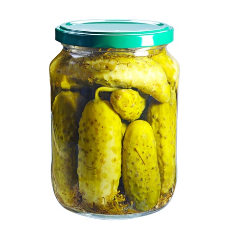 Pickled cucumber in glass jar with metal lid, isolated on whiteの写真素材