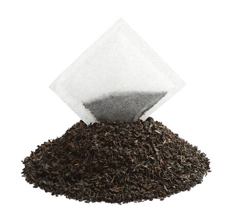 Tea bag and dry tea on a white backgroundの写真素材