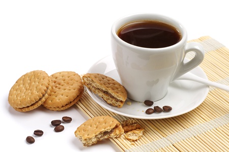 Coffee and cookies on white background の写真素材