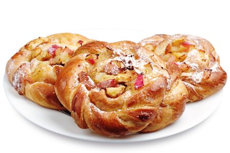 Three sweet buns with apple on white backgroundの写真素材