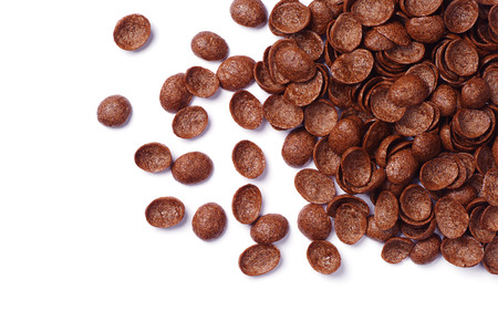 Background with chocolate cereals on white