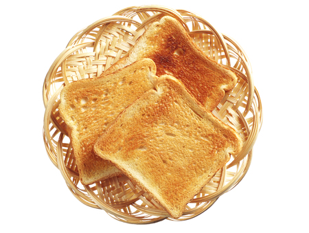 Toast bread in a wicker plate isolated on white background. Top view