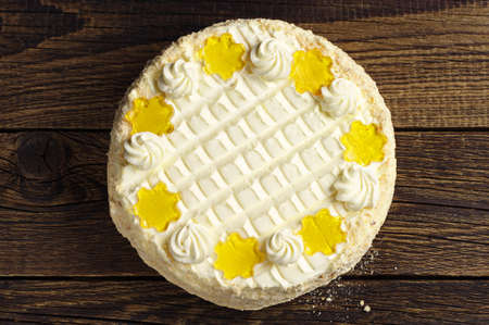 Top view of a delicious cake on old wooden tableの写真素材