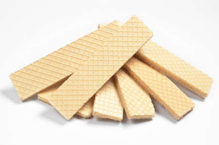 Heap of wafers on white background close-up