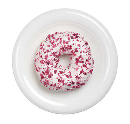 Donut with cheesecake filling on plate decorated with red fruit crumble isolated on white background, top viewの写真素材