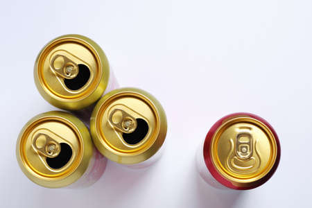 Opened beer cans on whiteの写真素材