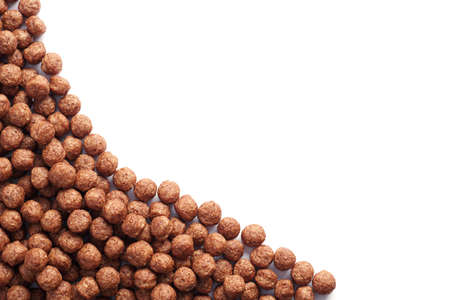 Chocolate corn balls isolated on white background, top view with copy space
