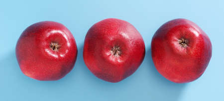 Fresh red apples on blue background, top view