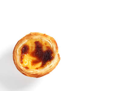 Traditional portuguese cake "Pastel de nata" on white background, top view with copy spaceの写真素材