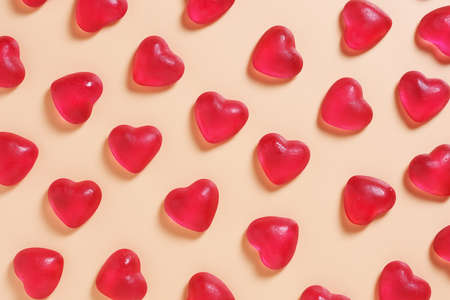 Heart shaped jelly candy, top view. Love background.