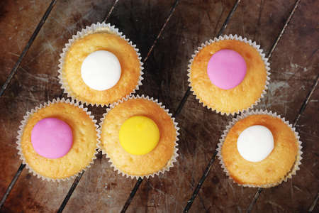 Biscuits with lemon flavor on old baking tray background, top view