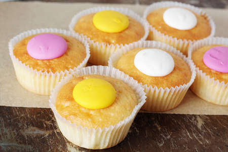 Biscuits with lemon flavor on old baking tray background