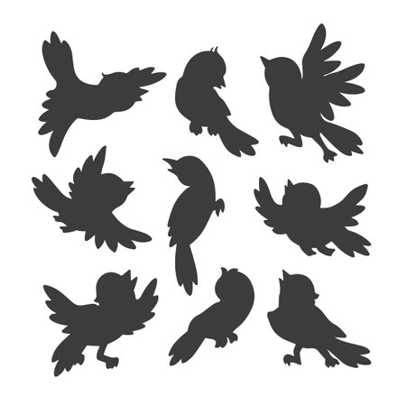 Birds. Set of black isolated hand drawn silhouettes of cartoon birds flying, sitting, chirping, with spread and folded wings. Graphic elements from Signs of Spring collection for nature designのイラスト素材