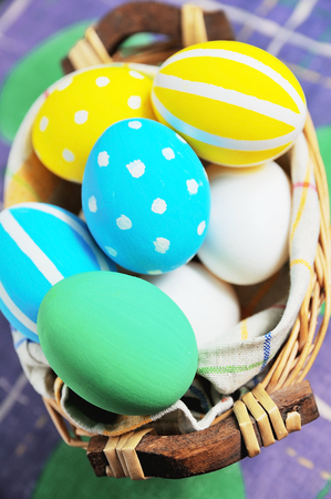 Easter eggs painted in pastel colors on white backgroundの写真素材