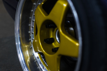 Alloy wheels and gold colorの写真素材