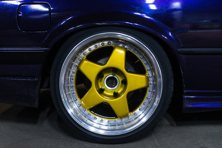 Alloy wheels and gold colorの写真素材
