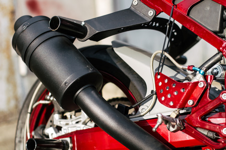 A close up of stunt motorcycle exhaust pipe, tuned for trick riding and better soundの写真素材