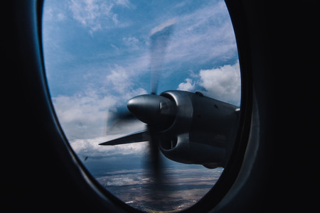 Turboprop engine view from illuminator with aerial bright background