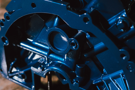 V8 Engine block table, painted in blue color. Loft stylish table furniture with tempered glassの写真素材
