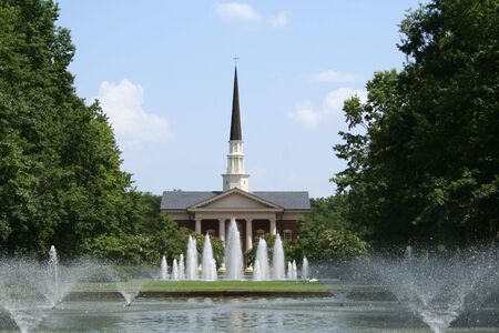 church with water fountains out frontの写真素材